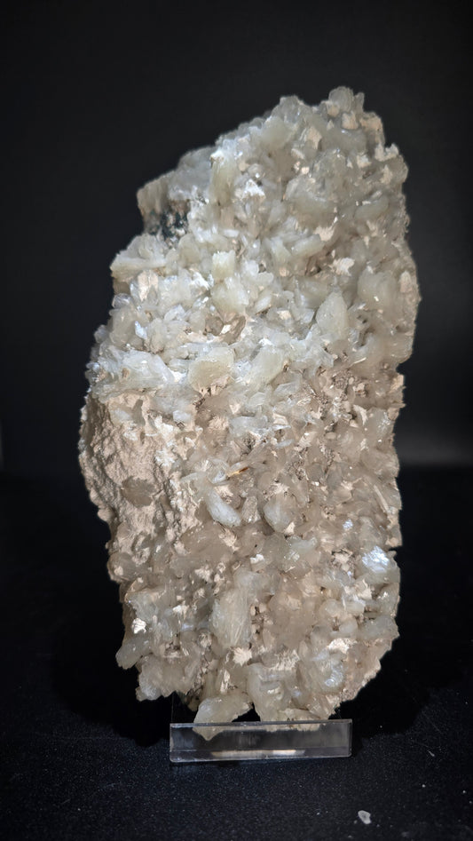 Stilbite Mineral sample on a black background